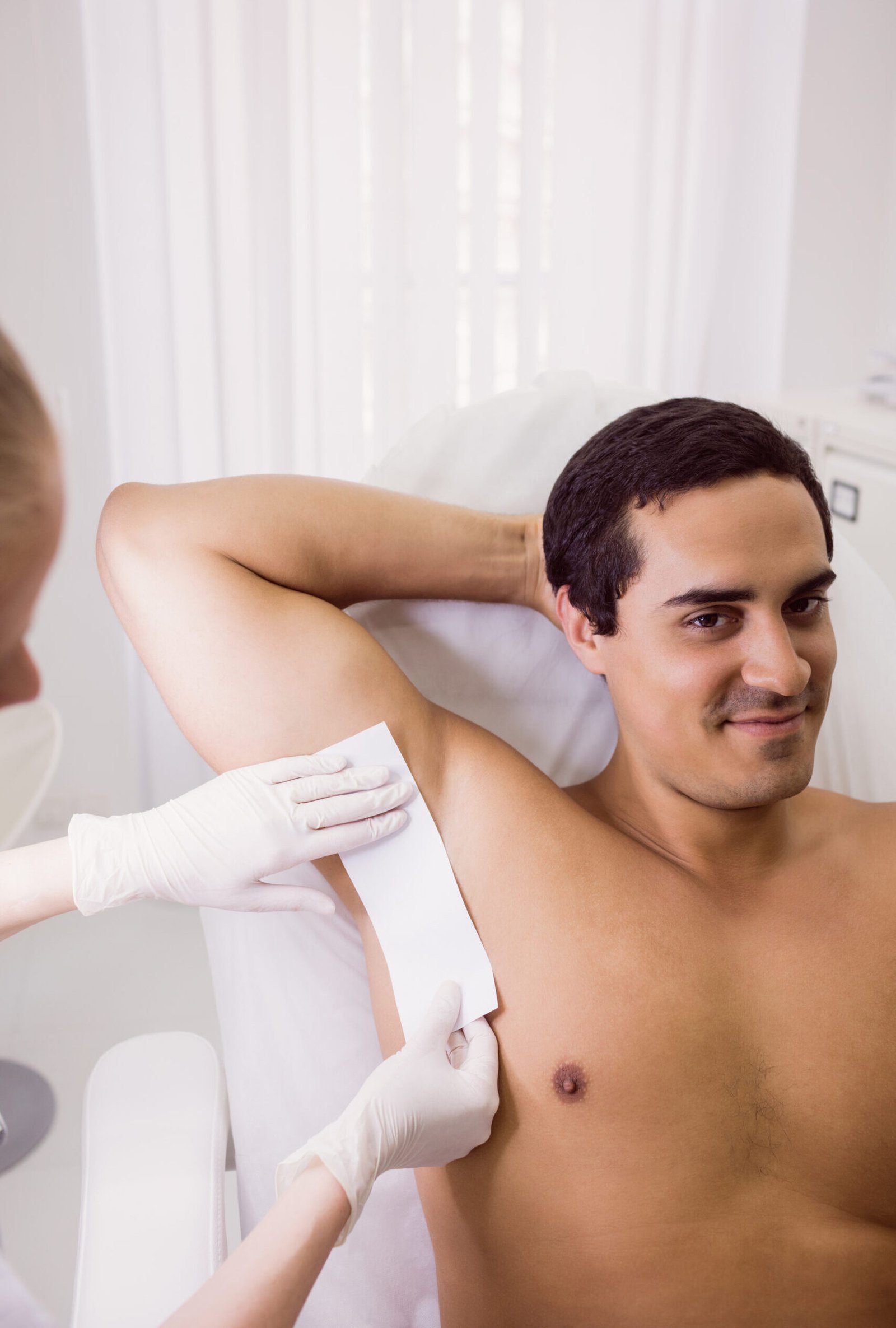 doctor waxing male patient skin 1 scaled e1789386105419 1