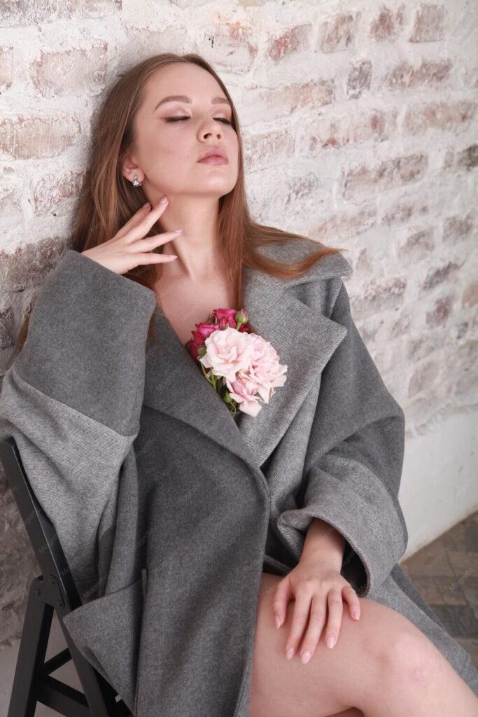 Veneers vs Teeth Whitening: Which Is Right for Your Smile? 19 fashion model wearing warm woolen gray coat decorated with pink roses spring floral theme 1599531 253