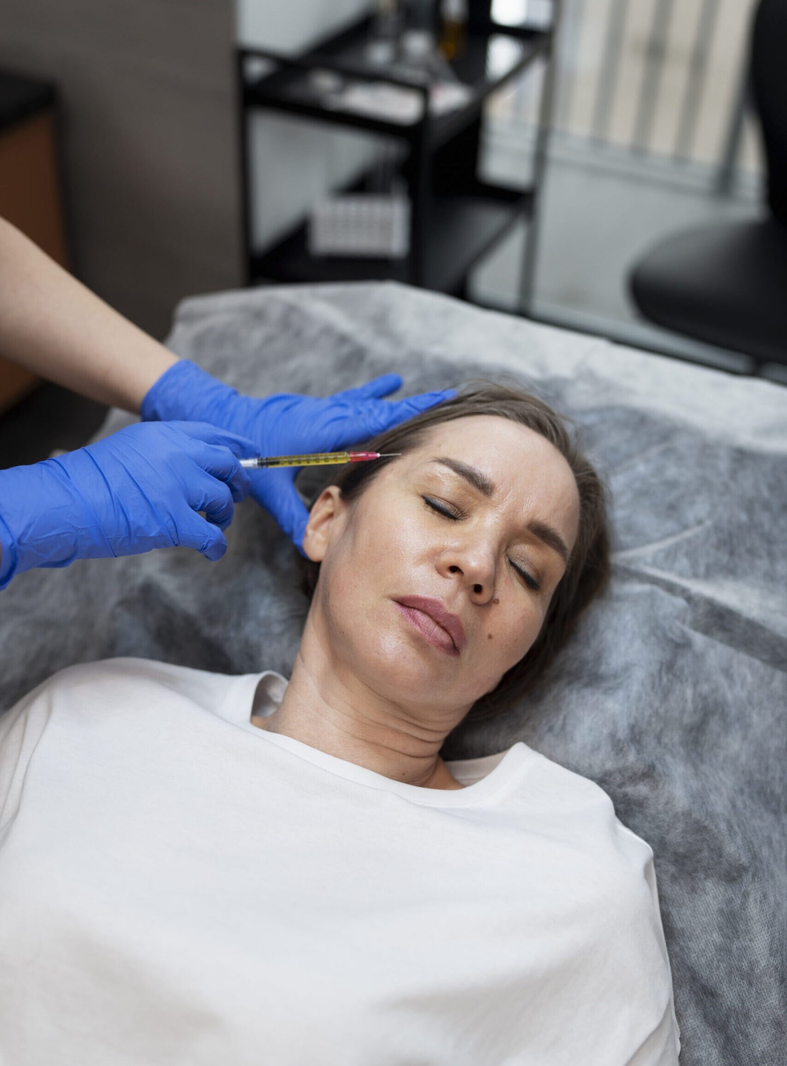high angle woman getting prp injection scaled e1789588178106