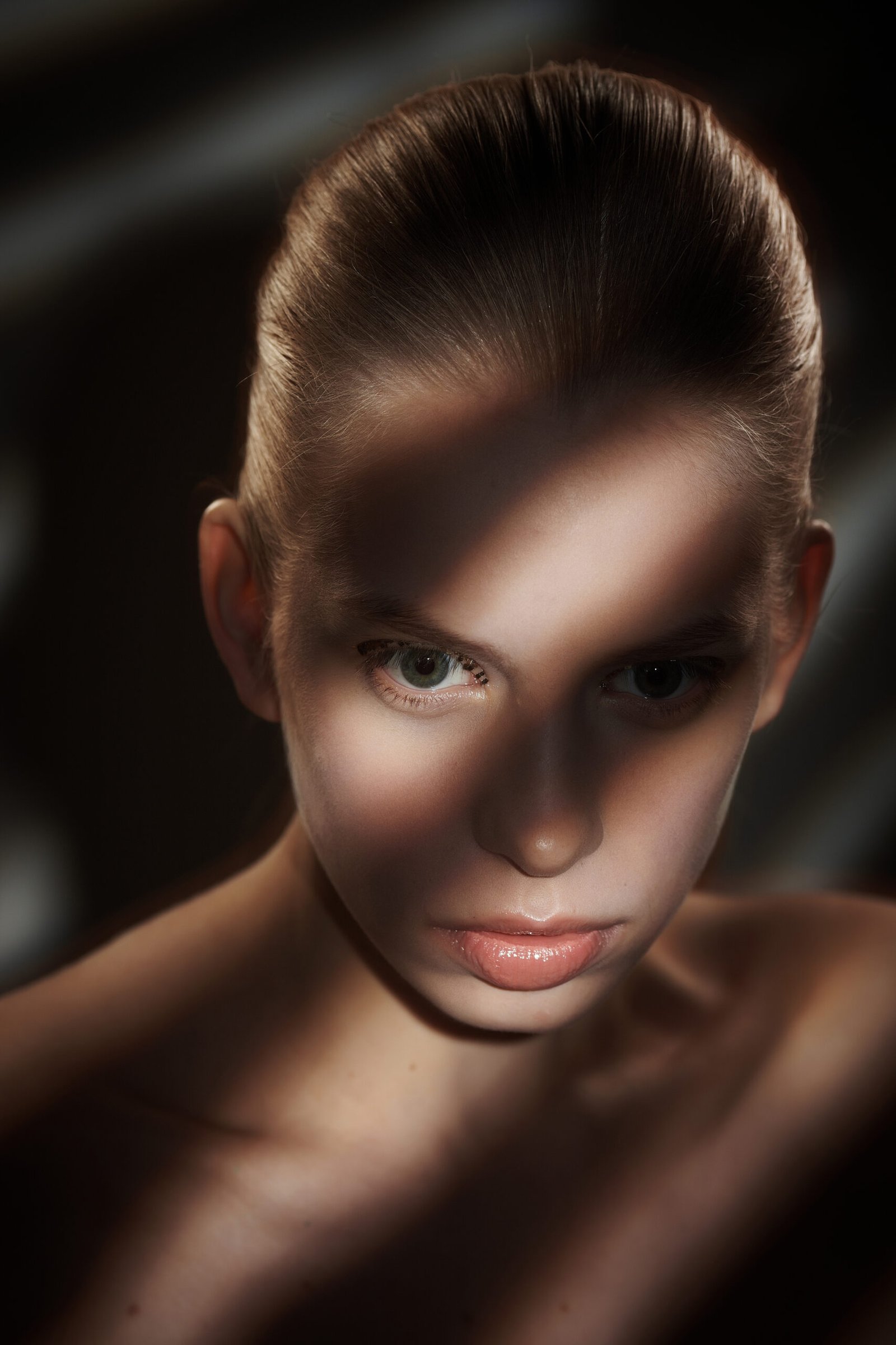 portrait blond woman with shadows lights her face scaled