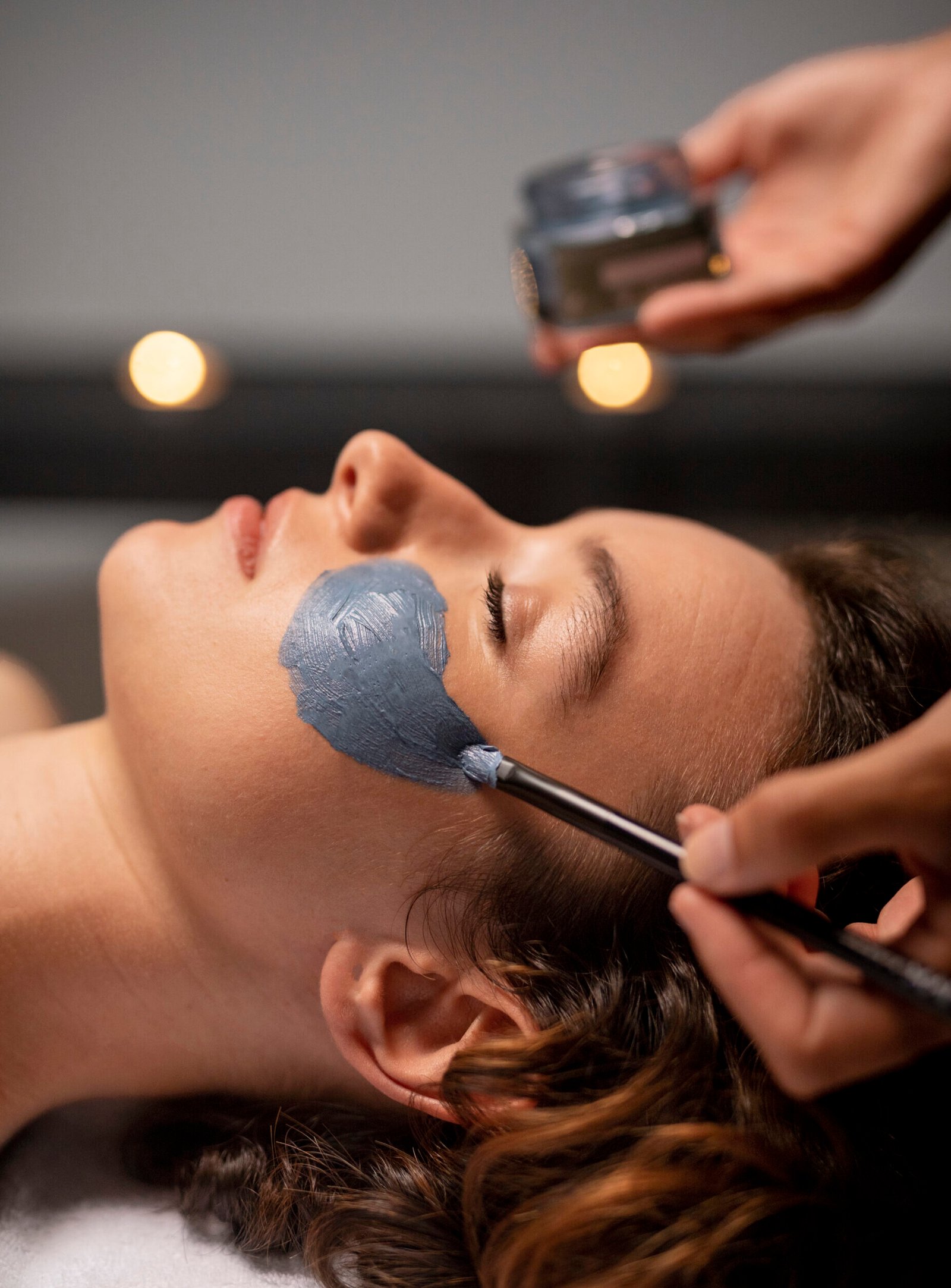 woman getting face treatment close up 1 scaled e1789587961940