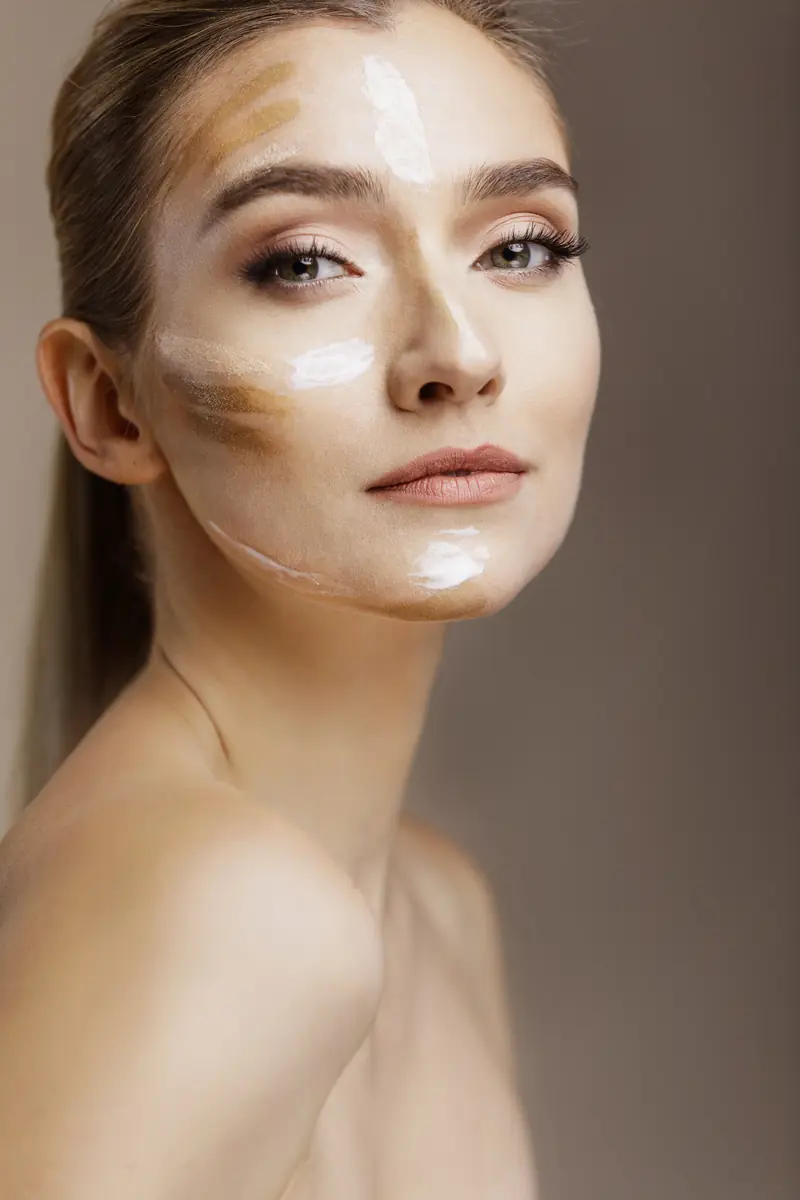 woman s face with cream it tiny